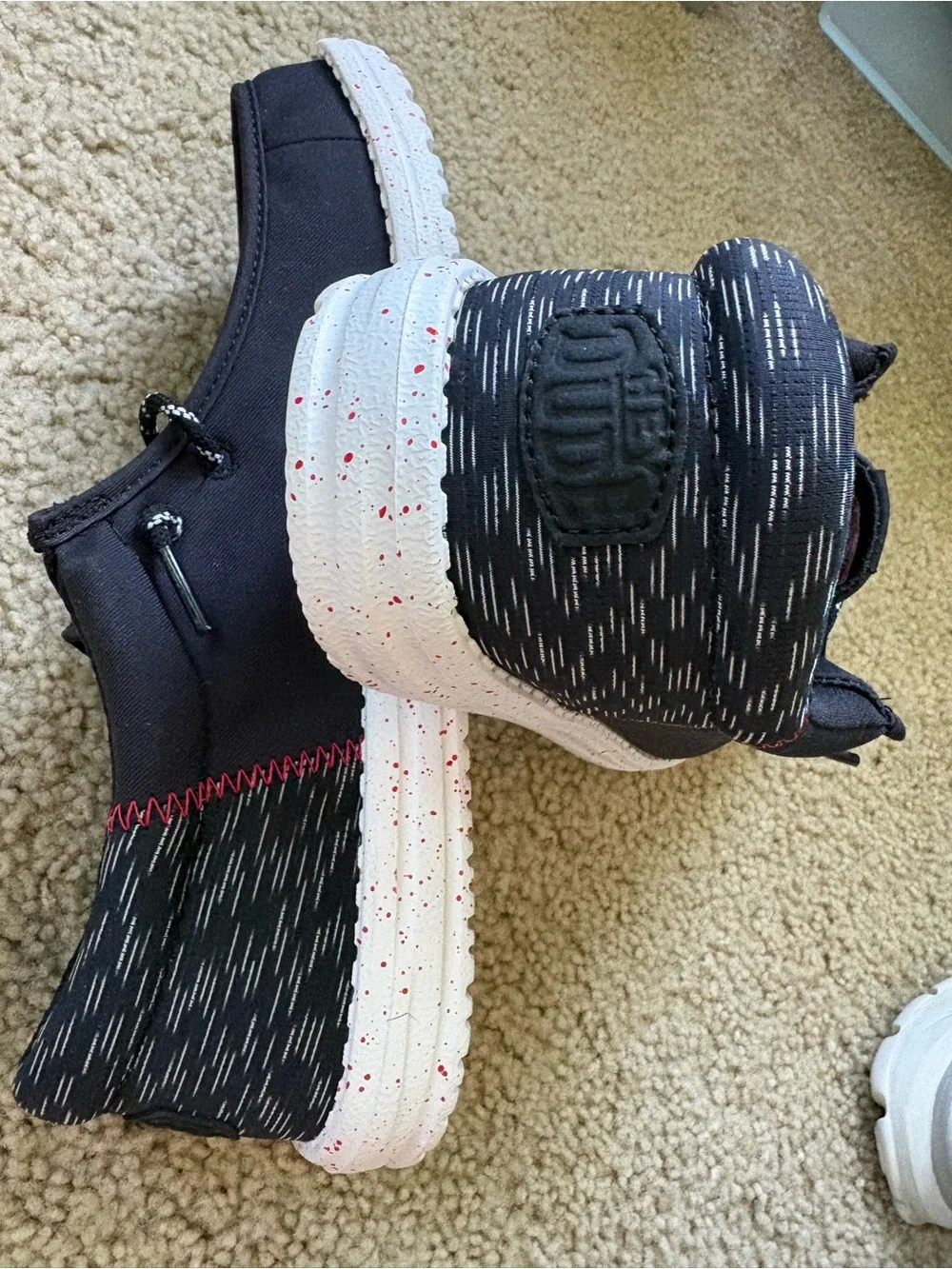 Hey Dude Black Canvas Slip-On Shoes with Red Insoles
